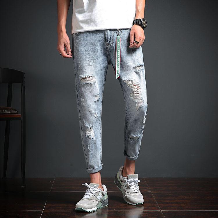 LIGHT BLUE STRETCH DISTRESSED DENIM JEANS