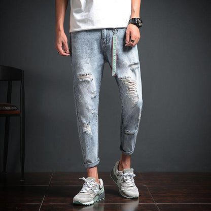 LIGHT BLUE STRETCH DISTRESSED DENIM JEANS