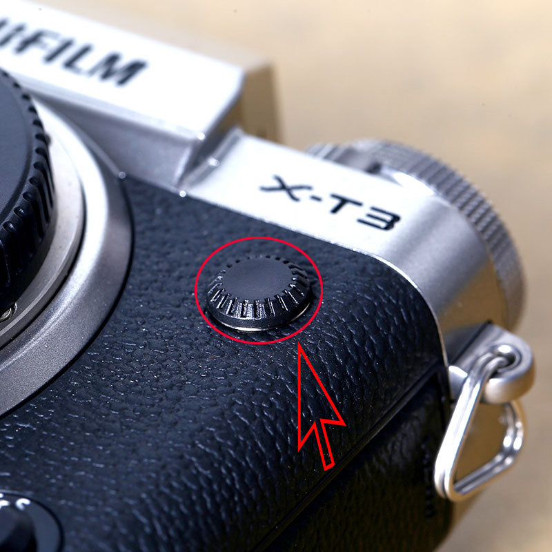 Camera shutter cover button