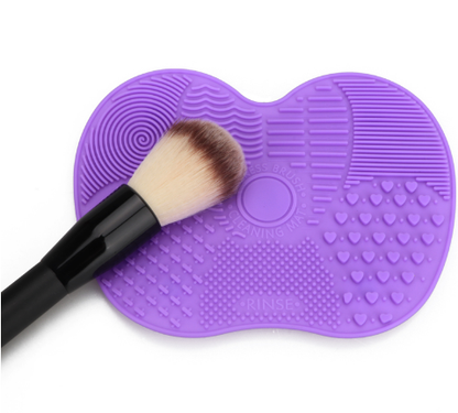 Makeup brush cleaning pad