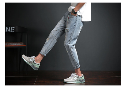 LIGHT BLUE STRETCH DISTRESSED DENIM JEANS